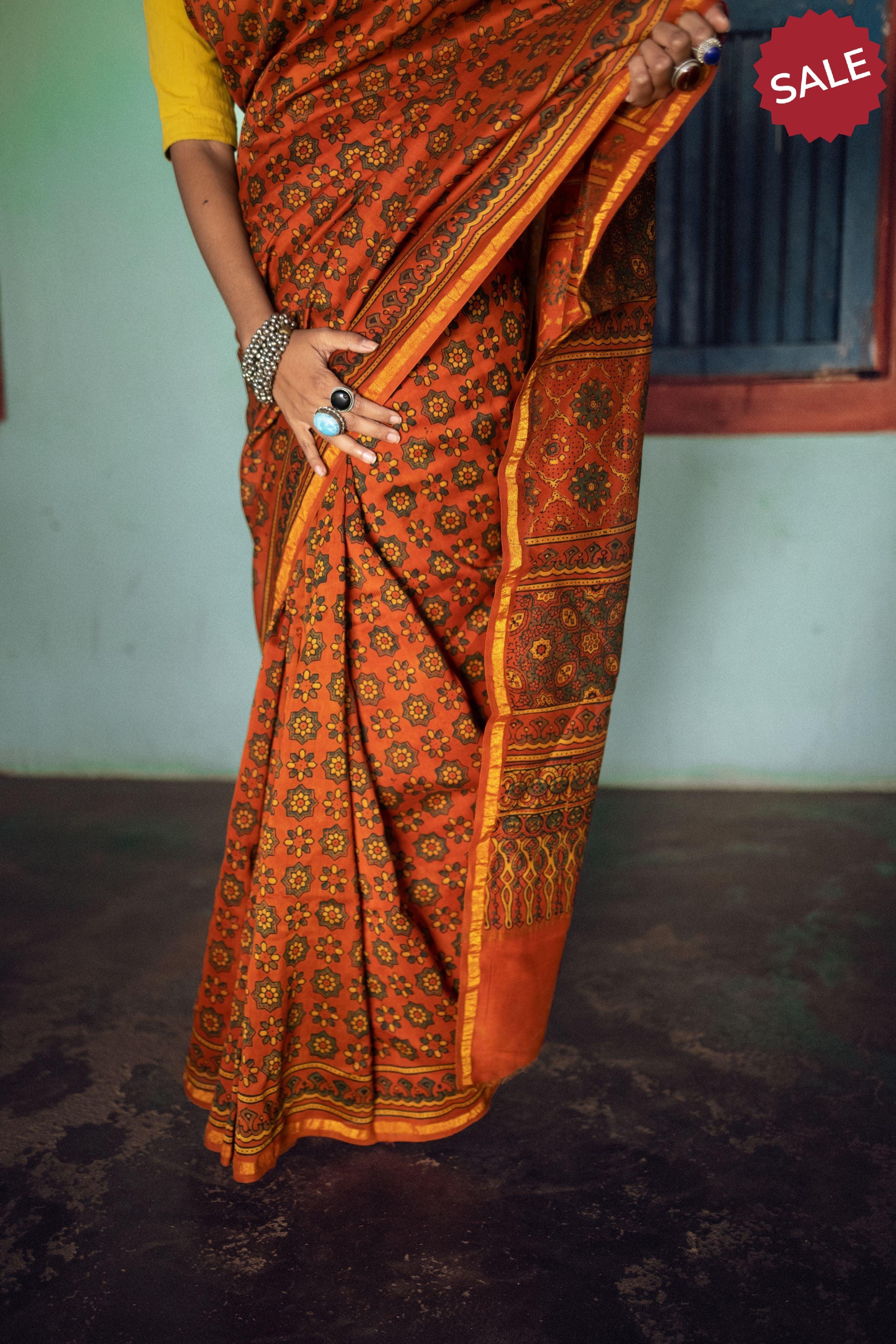 Jharokha -Orange green silk cotton Ajrakh handblockprinted saree