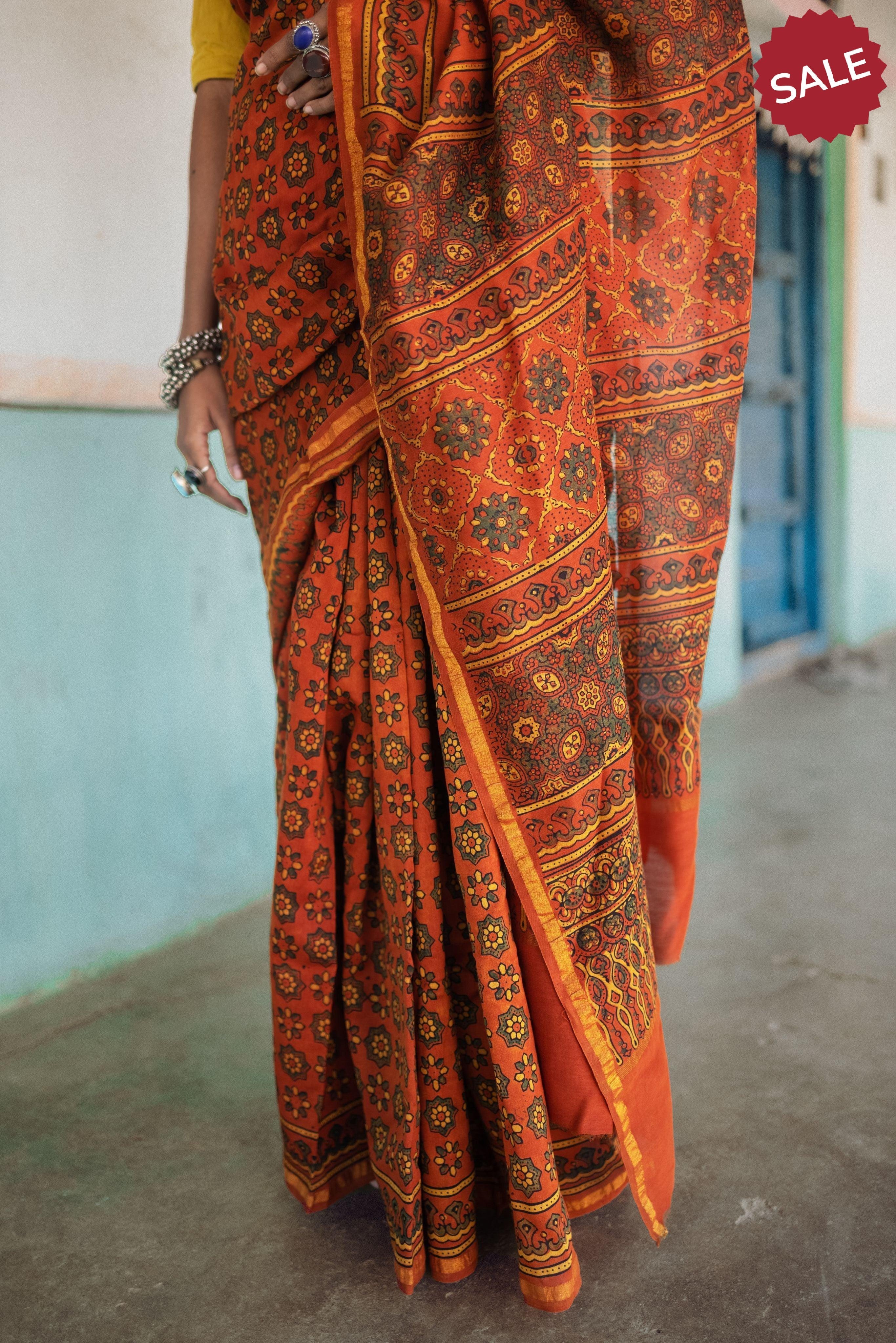 Jharokha -Orange green silk cotton Ajrakh handblockprinted saree